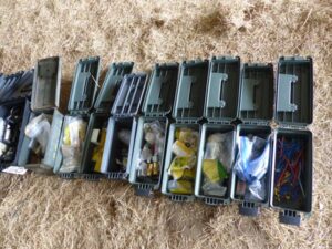 LOT 125 14 POLY AMMO BOXES, 1 METAL AMMO BOX 