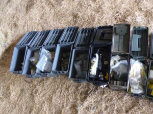 LOT 125 14 POLY AMMO BOXES, 1 METAL AMMO BOX 