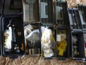 LOT 125 14 POLY AMMO,/ BOXES 1 METAL AMMO BOX 