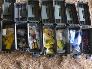 LOT 125 14 POLY AMMO BOXES, 1 METAL AMMO BOX 