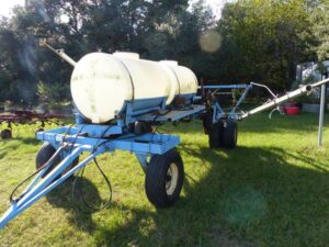 LOT 26 DUAL TANK 300 GAL SPRAY RIG WITH 34 FT BOOMS 