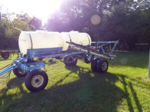 LOT 26 DUAL TANK 300 GAL SPRAY RIG WITH 34 FT BOOMS 