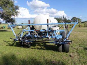LOT 26 DUAL TANK 300 GAL SPRAY RIG WITH 34 FT BOOMS 