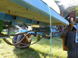 LOT 26 DUAL TANK 300 GAL SPRAY RIG WITH 34 FT BOOMS 