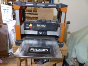 LOT 44 RIDGID 13 INCH THICKNESS PLANER WITH TABLE 