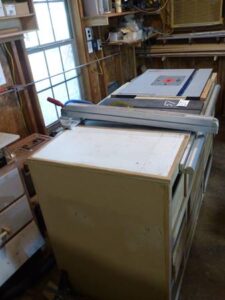 LOT 57 HOMEMADE WORK TABLE 