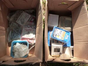 LOT 73 2 BOXES OF MISC METAL SCREWS &  7/16" PLYWOOD CLAMPS