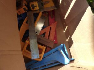 LOT 75 BOX OF SQUARES RULERS LEVELS 