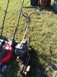 LOT 77 HONDA HR194 HB 20 LAWN MOWER W/BAGGER,