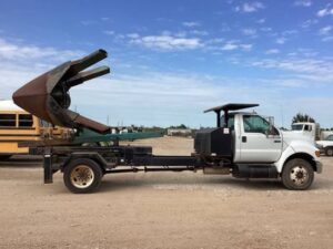 LOT 4311 2007 FORD F 750 UT TRUCK WMOUNTED HYDR HOLT TREE SPADE 