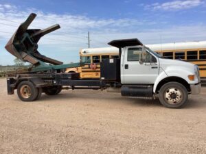 LOT 4311 2007 FORD F 750 UT TRUCK WMOUNTED HYDR HOLT TREE SPADE 