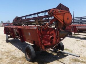 LOT 5883 CASE 1010 20 FT GRAIN PLATFORM WITH HEADER TRAILER 